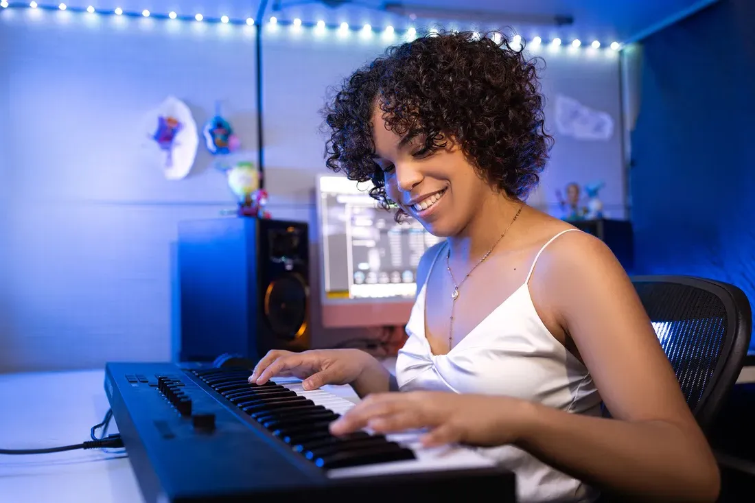 Student Marie Elise Anderson playing the piano.